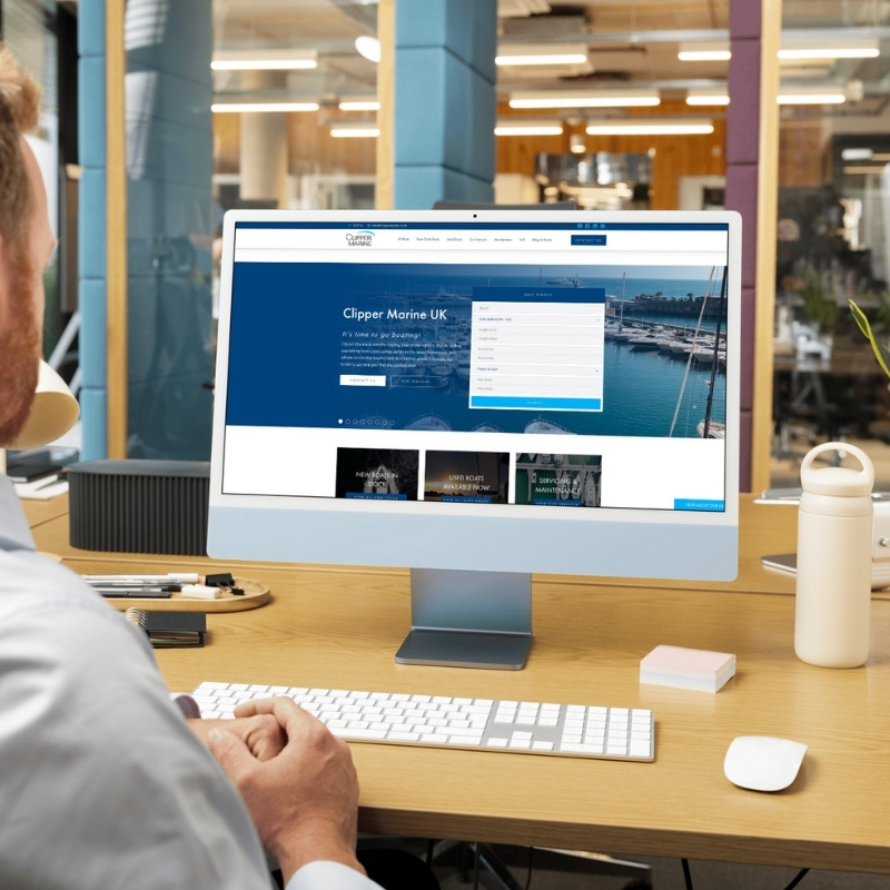 Computer screen mockup presenting the Clipper Marine website design.