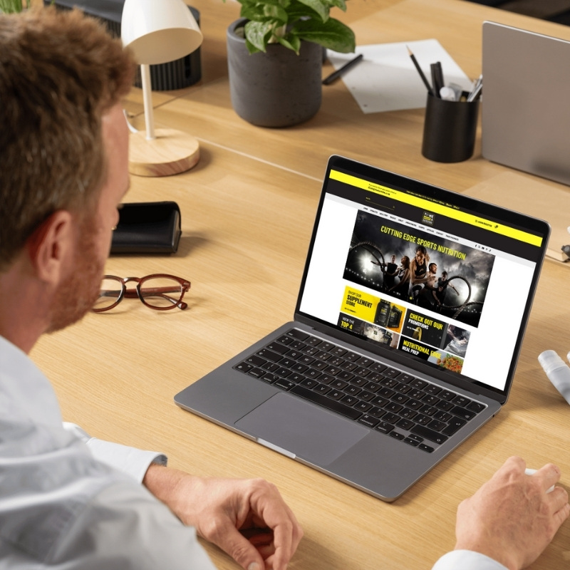 Laptop mockup showcasing the Time4Nutrition website homepage.