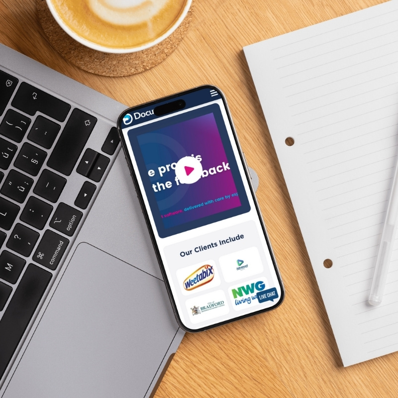 Smartphone screen mockup displaying Documation’s responsive website layout.