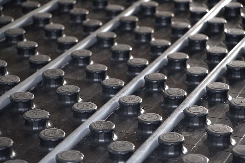 Close-up of rooftop solar panels installed in neat rows.