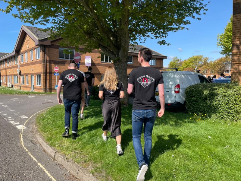 BoxChilli team members wearing branded T-shirts.