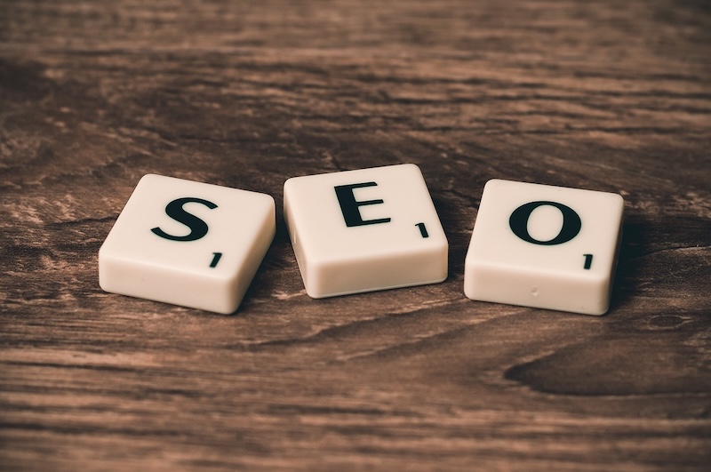 Wooden letter tiles spelling out the word SEO.