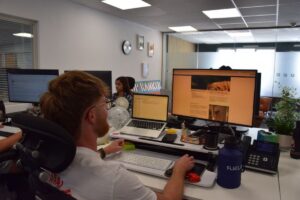 an picture of chatgpt seo agency workers in their office